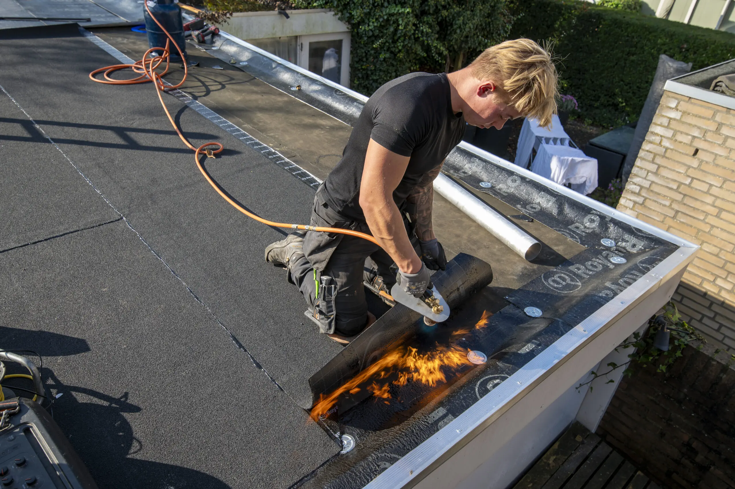 Plat dak renoveren Overasselt